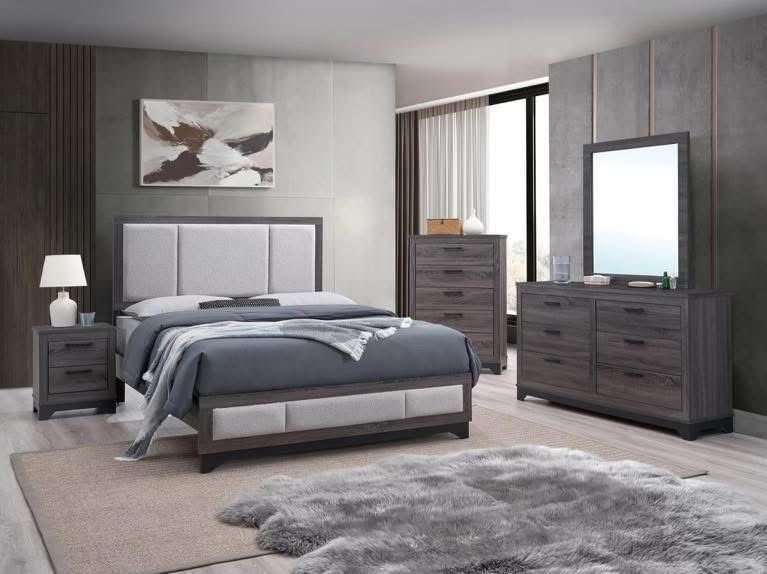 Modern gray bedroom with bed, nightstands, dresser, mirror, artwork, and a shag rug