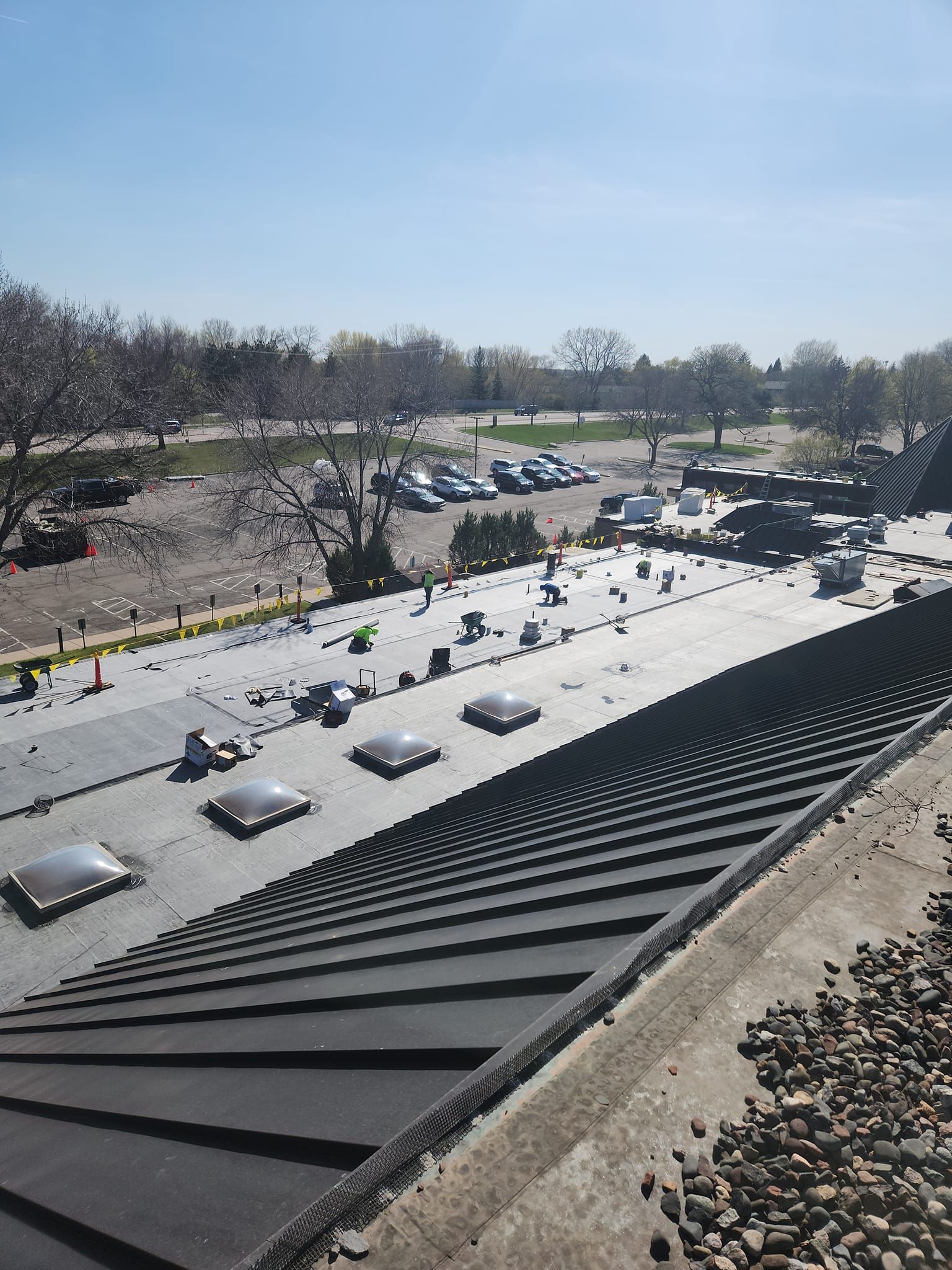 The roof of a building with a lot of skylights on it