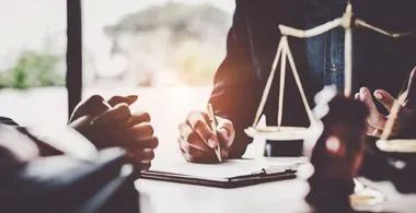 Lawyer and client discussing legal issues