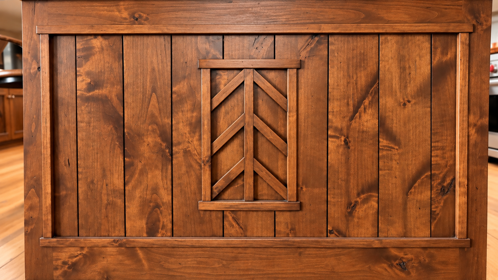Wooden barn-style panel with a chevron-patterned center on a rustic brown door