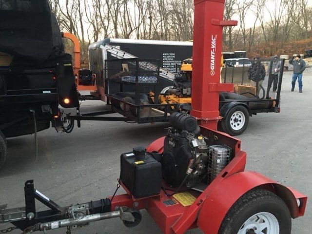 A red trailer with a giant inc. logo on it