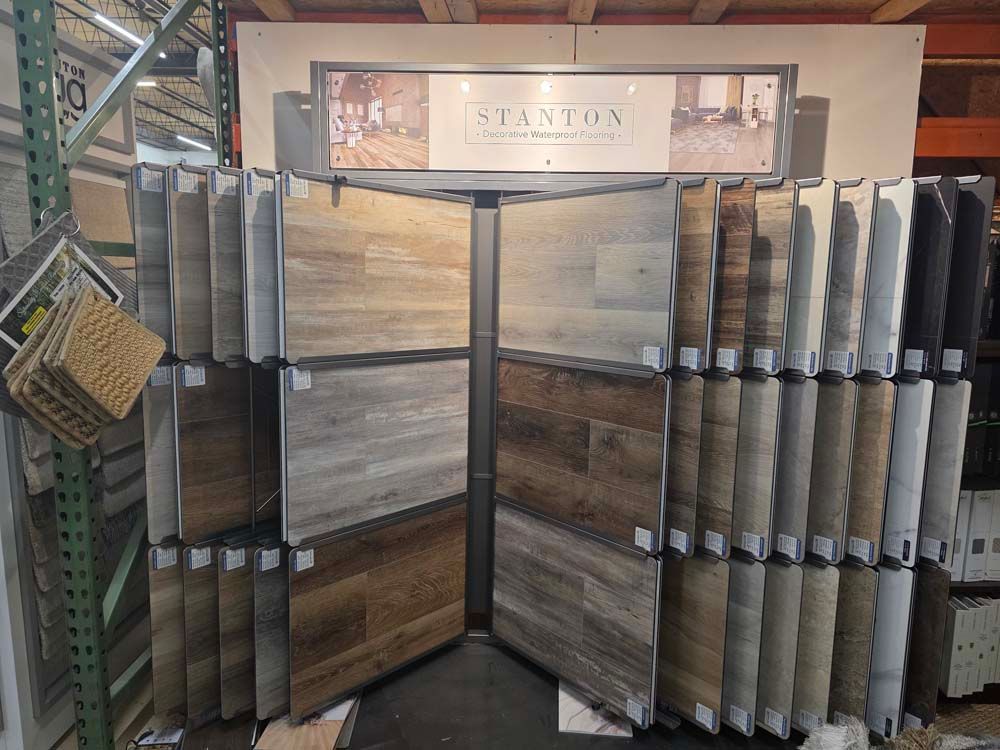 Display of carpet samples in a showroom.