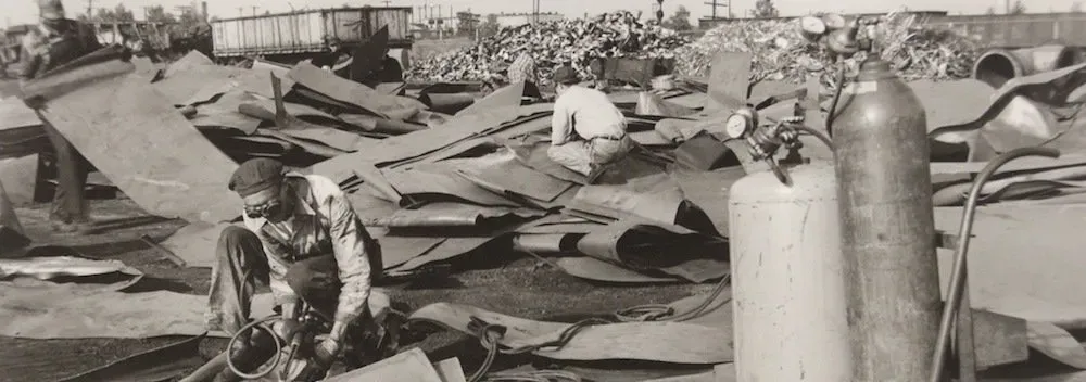 People working on scrap metals