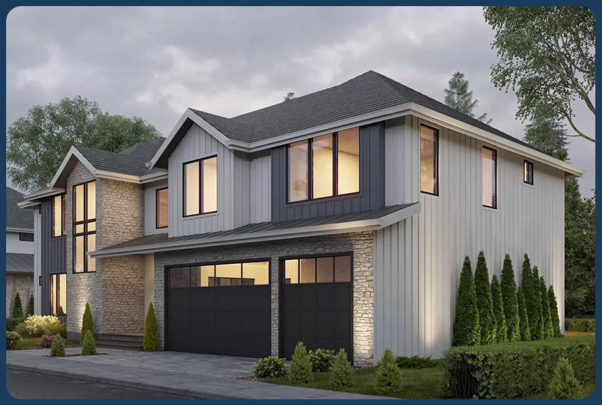 Modern two-story house with gray and white siding, stone accents, and a two-car garage.