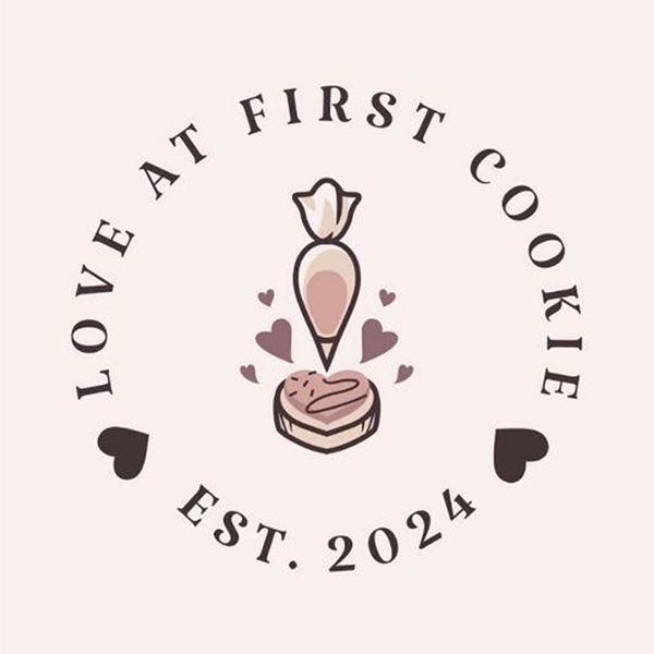 Logo: Circle with text Love at First Cookie, piping bag frosting heart cookie, hearts, and EST. 2024.