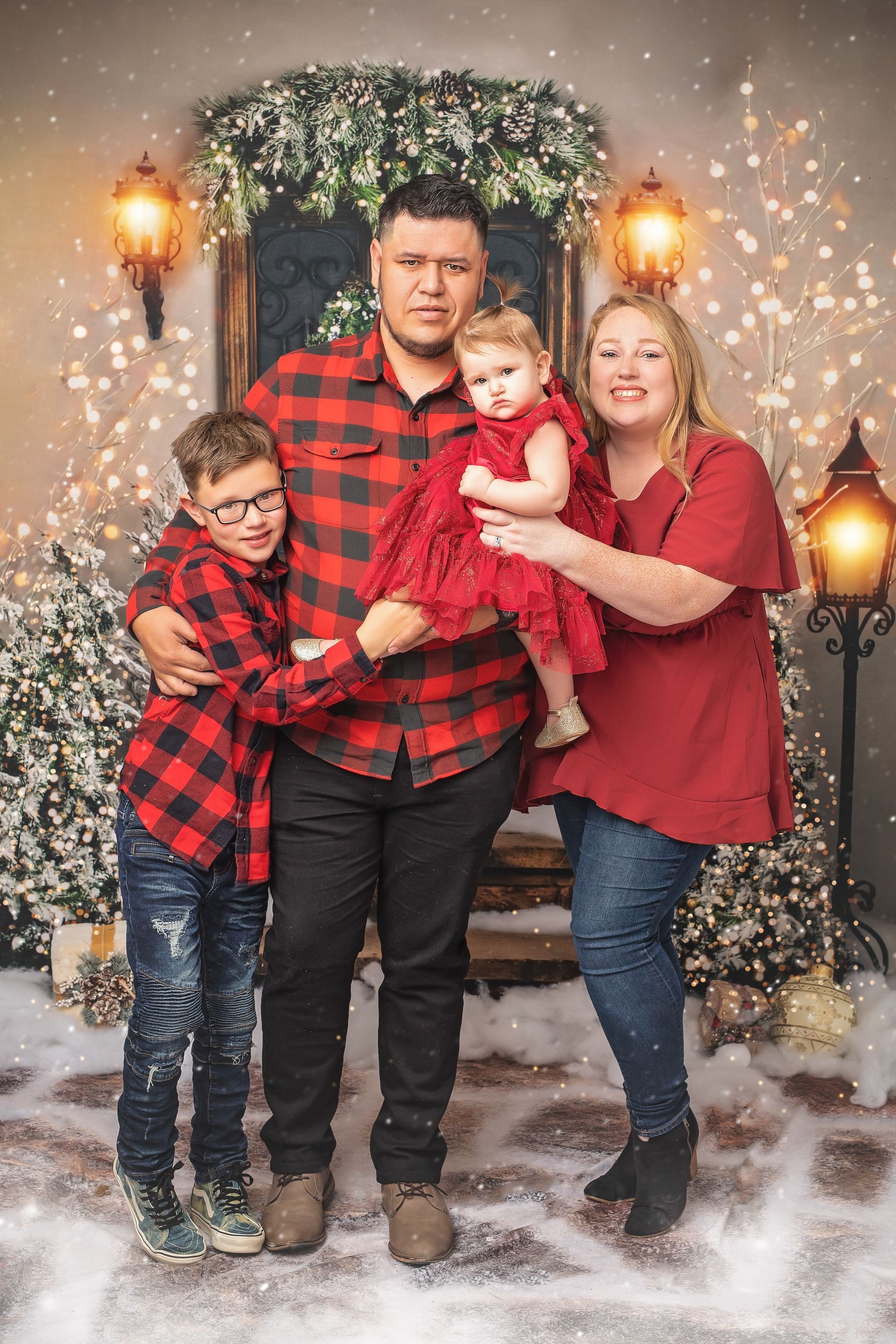 A family is posing for a picture.