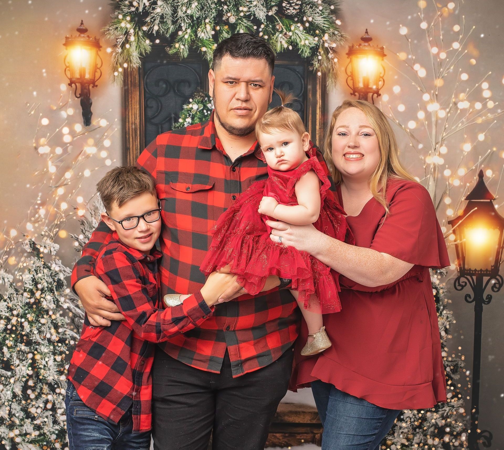 A family is posing for a picture.