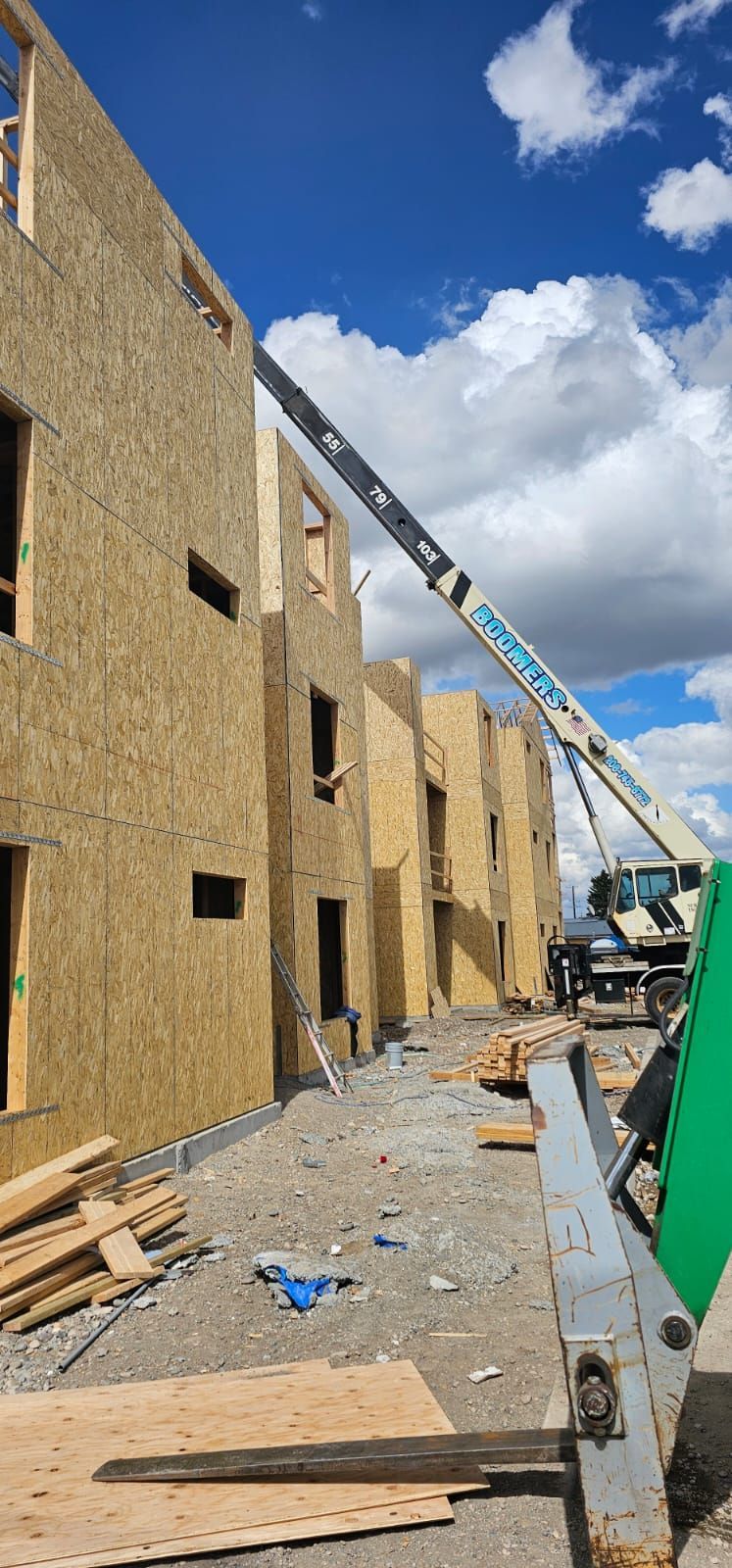 A large crane is being used to build a building.