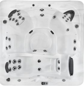 Overhead view of a white hot tub with multiple jet clusters and seating areas.