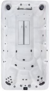 Overhead view of a white, rectangular swim spa with jets and a central dividing wall.