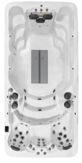 Top-down view of a white swim spa with various jets and seating areas. Includes a cover that is closed.