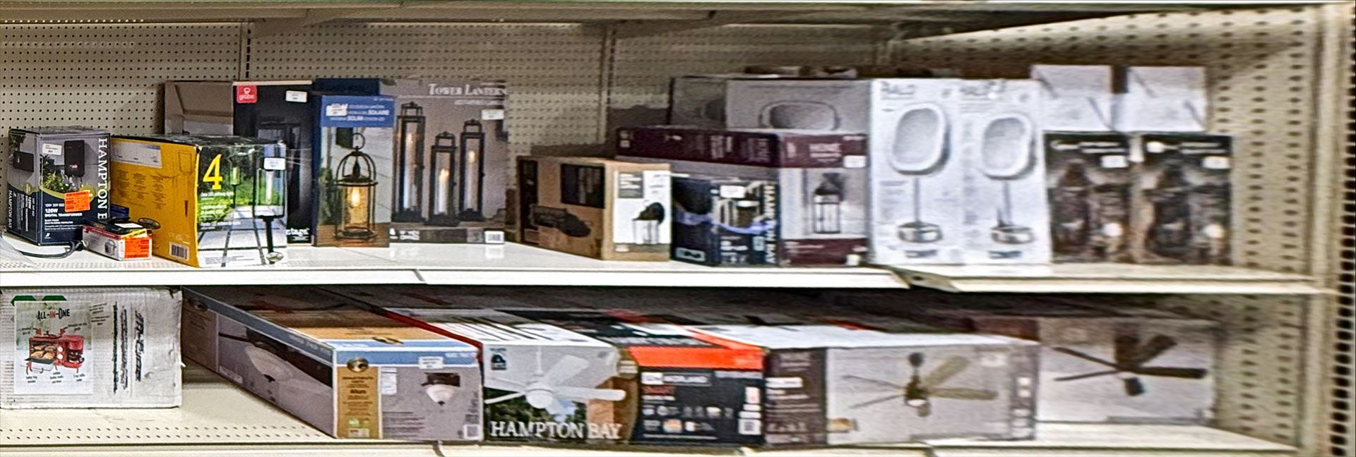 Shelves stocked with various boxed items, possibly for retail sale.