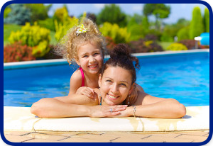 Mother & daughter enjoying in a pool