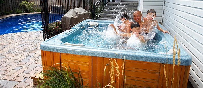 Family enjoying in a hot Tub