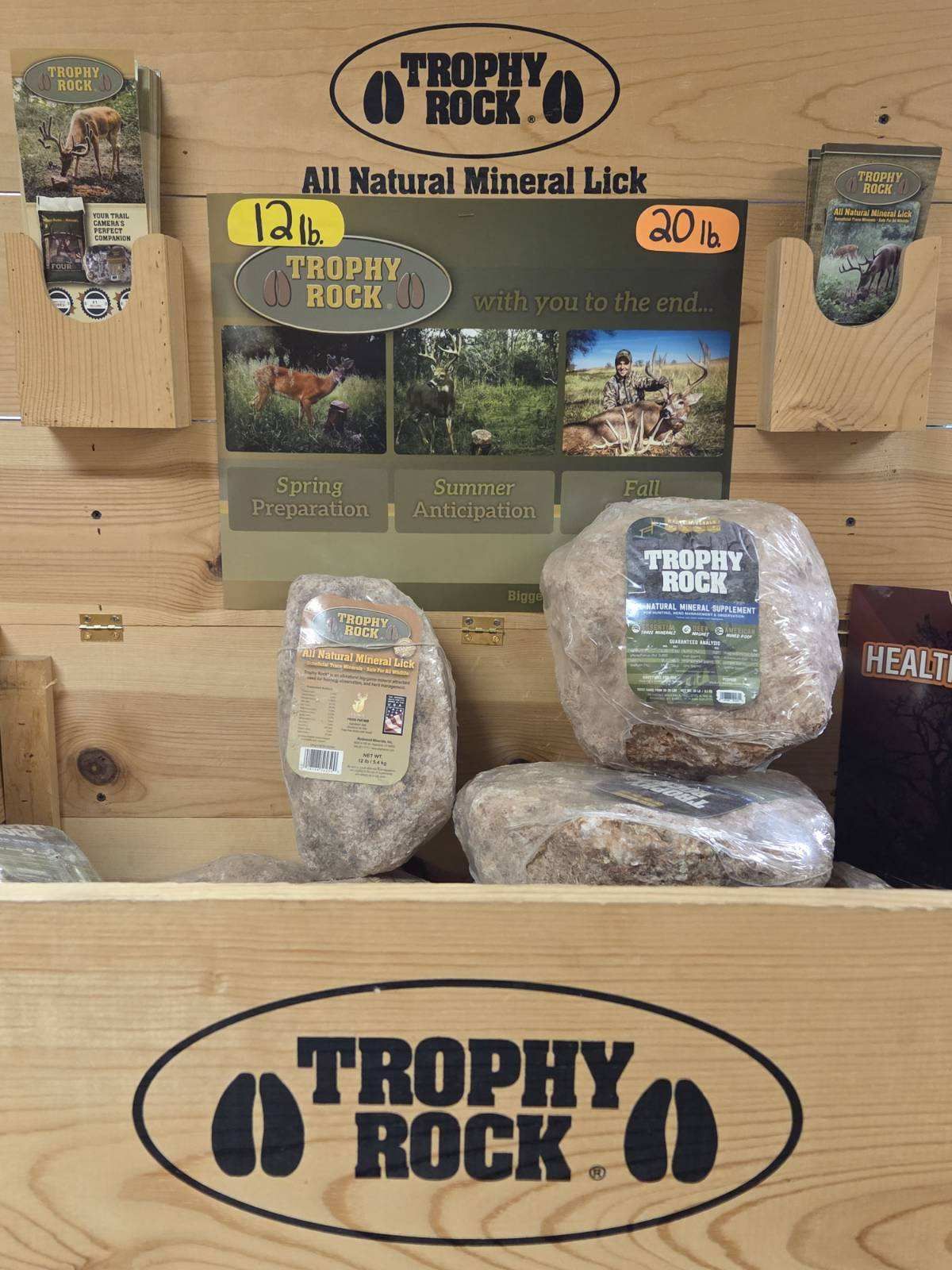 A wooden box with trophy rock written on it
