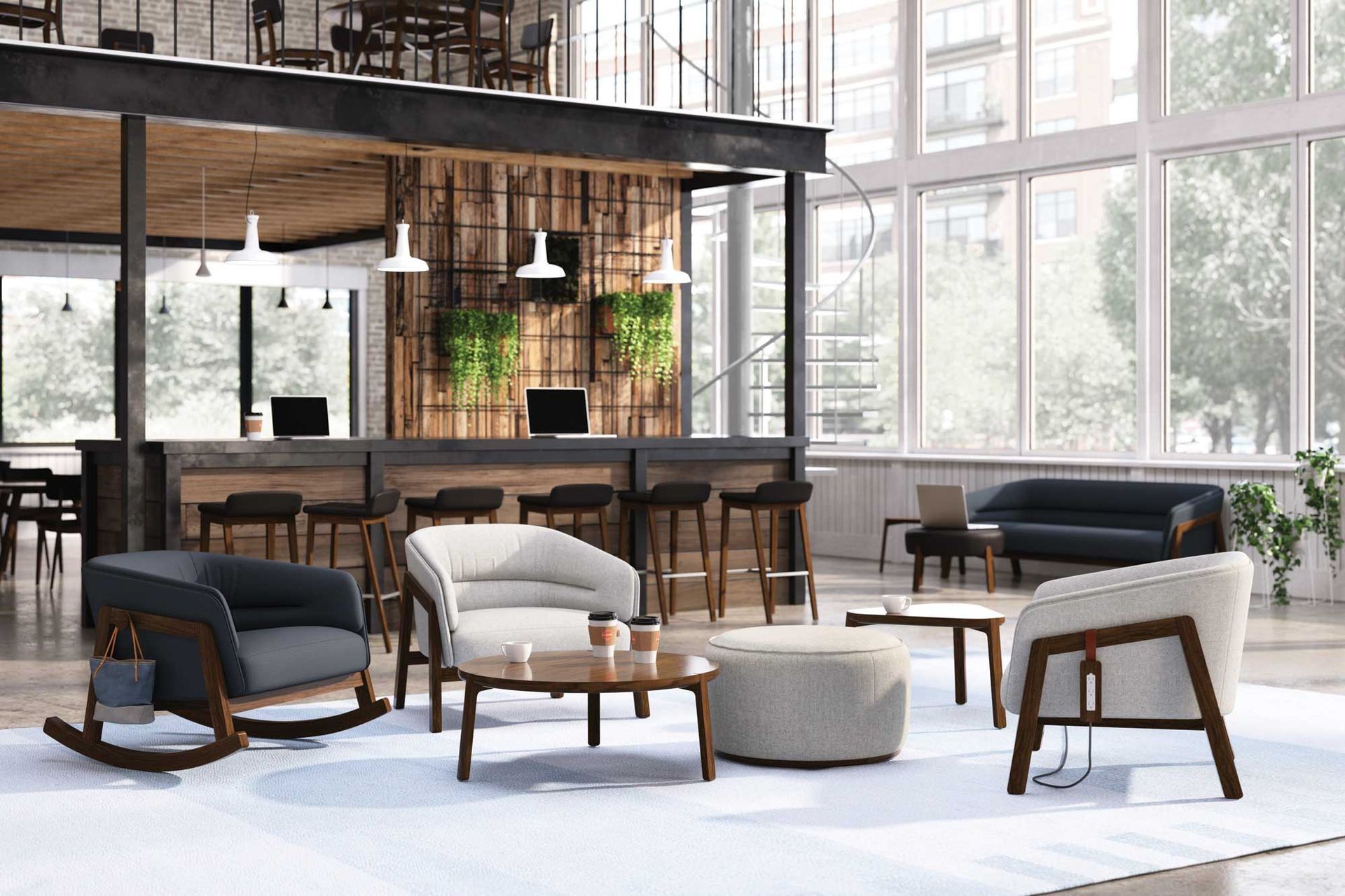 Modern lounge with leather chairs, round table, and a bar in a bright industrial-style room