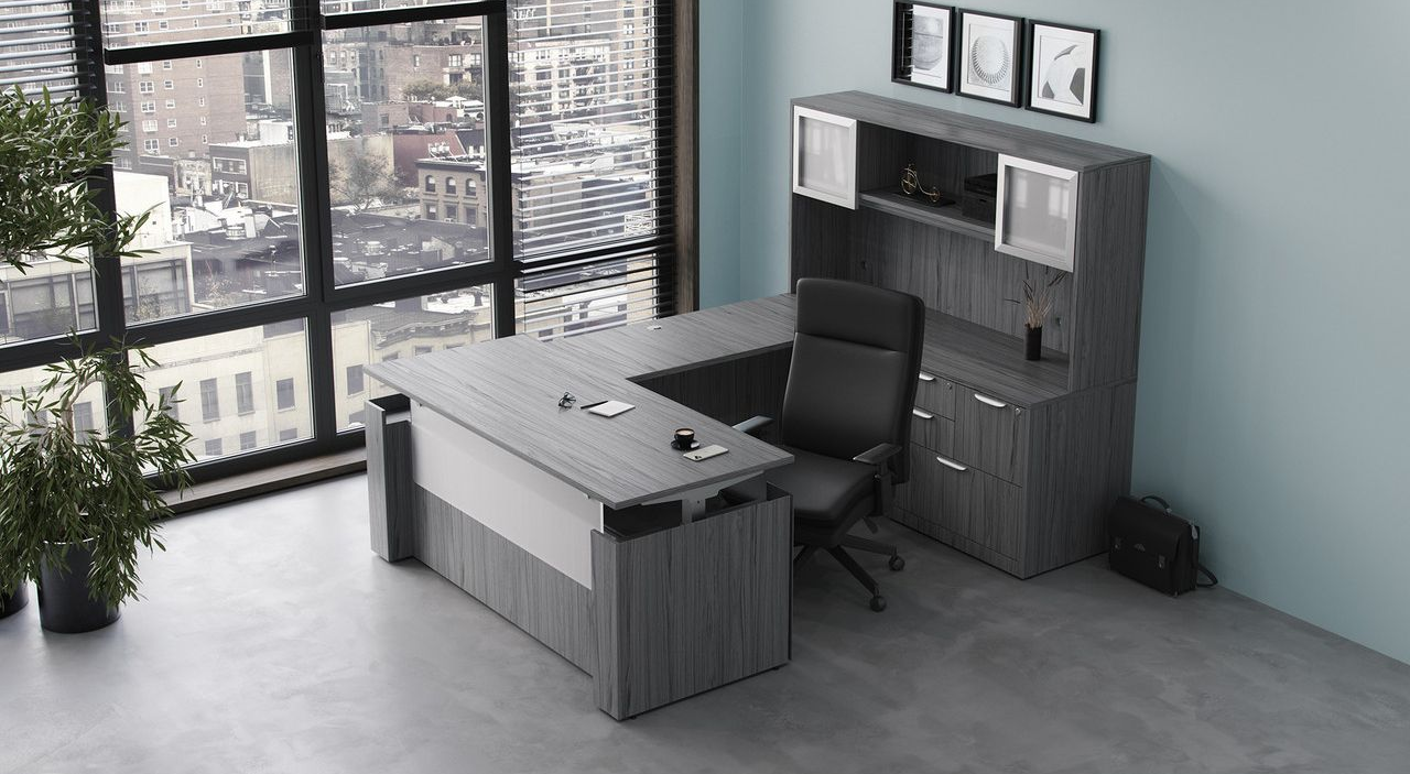 Modern gray office with desk, chair, cabinets, and large windows overlooking a city view