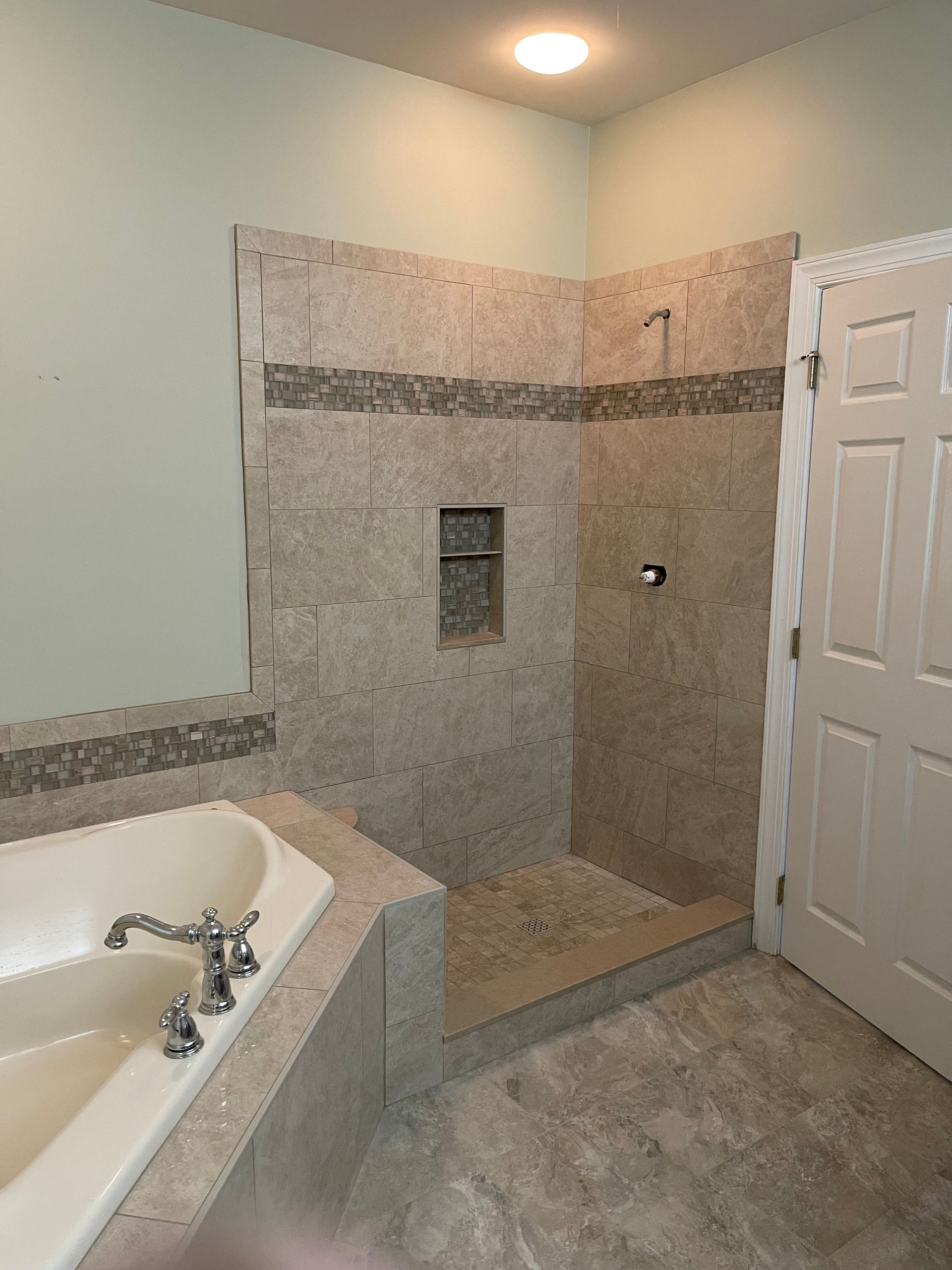 bathtub and new tiles