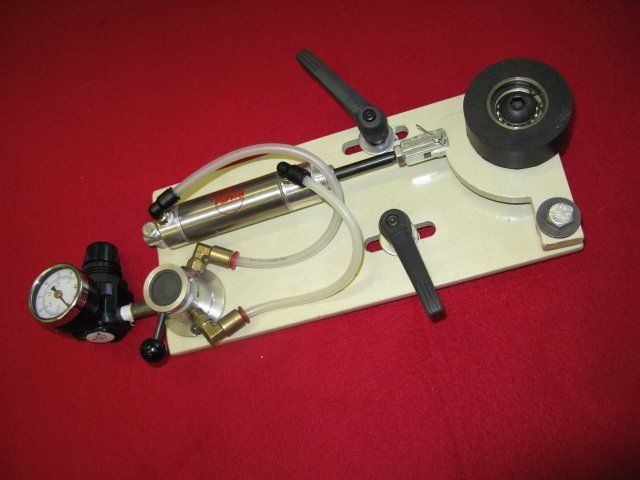 A piece of equipment with a gauge on it