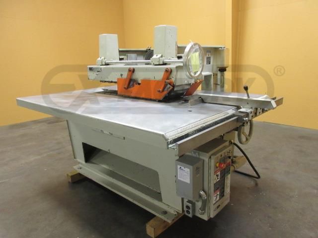 A machine is sitting on a table in a room