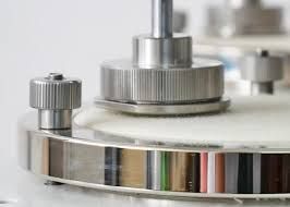 A close up of a metal object on a table.