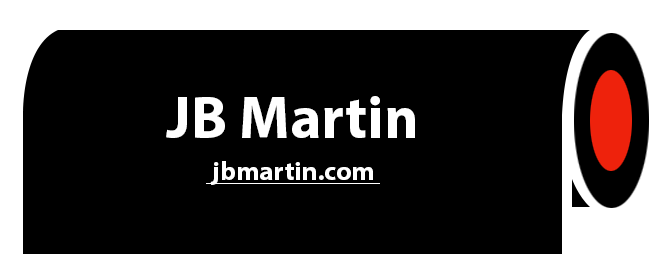 A black sign with the name jb martin on it