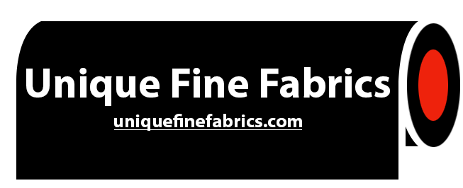 A black and white logo for unique fine fabrics