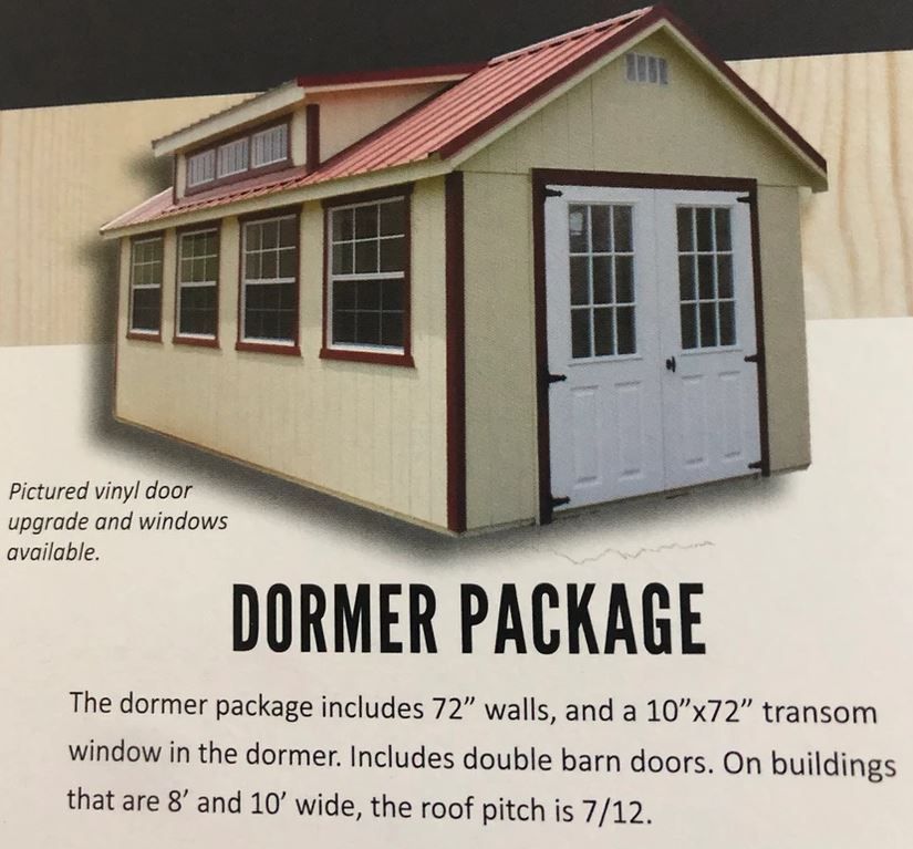 A cream-colored shed with a red metal roof and dormer windows, featuring double doors and text describing a dormer package.