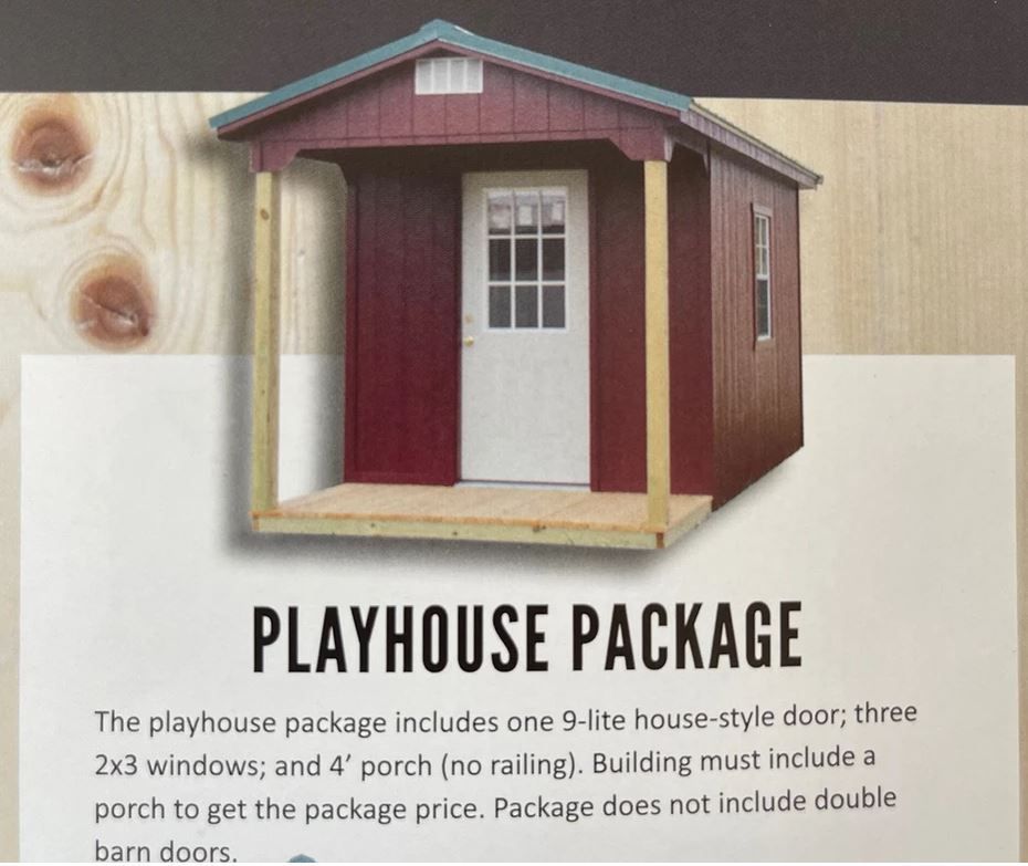 A red shed with a porch and white 9-lite door, described as a playhouse package with windows and no porch railing.