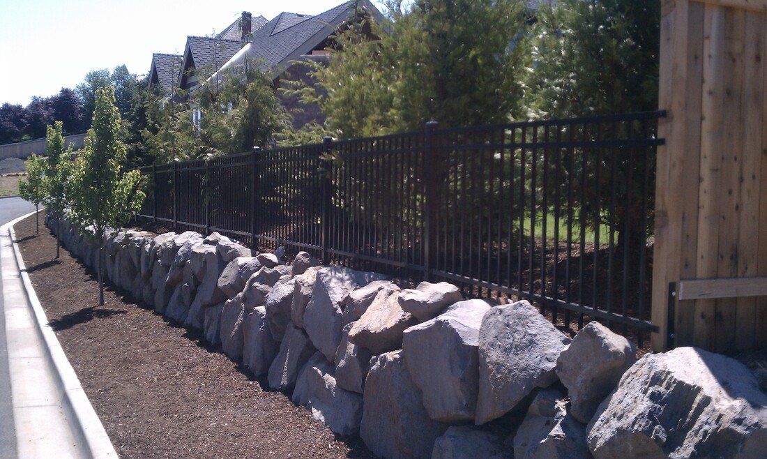 fence with rocks