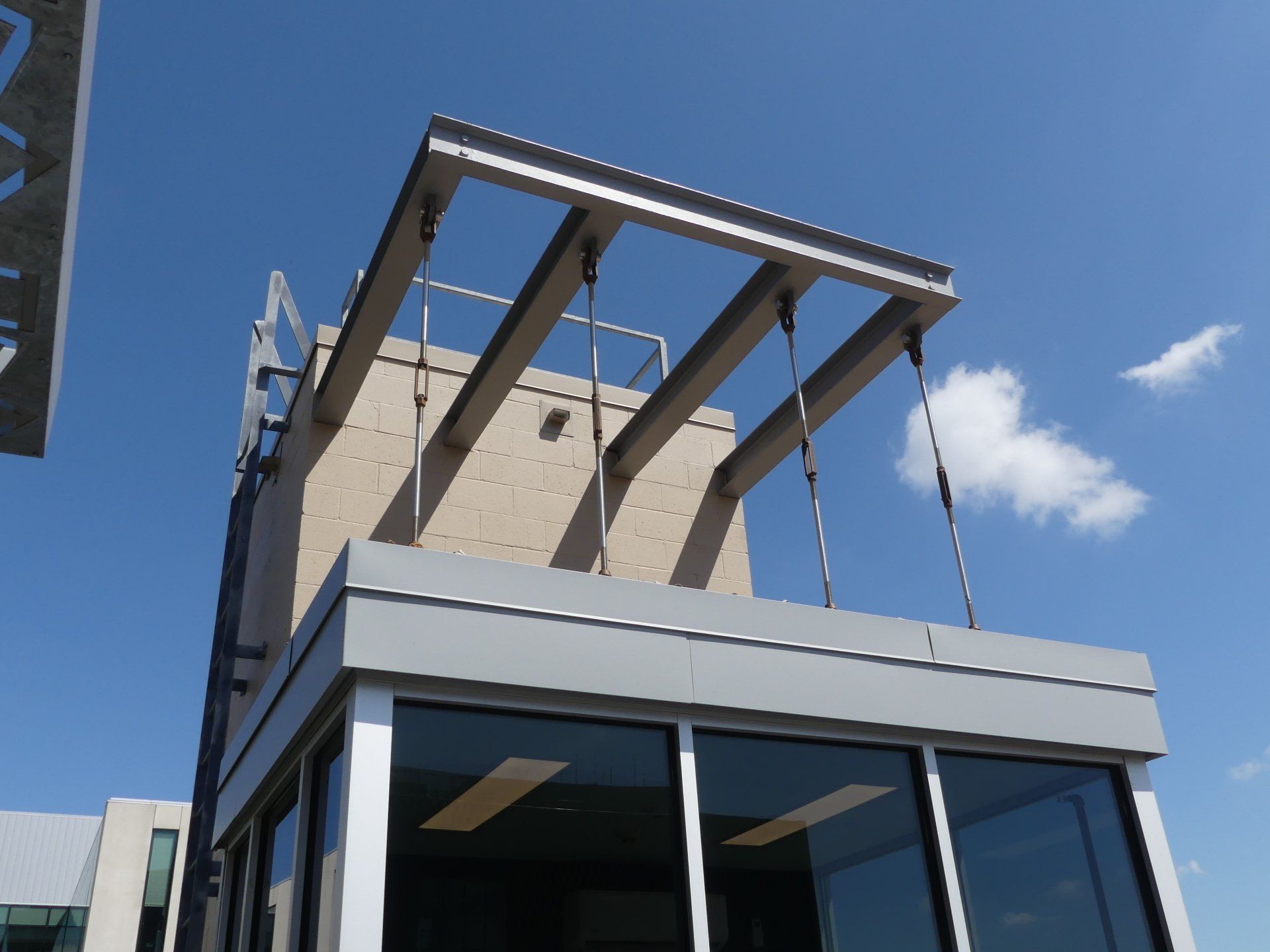 A building with a canopy on top of it