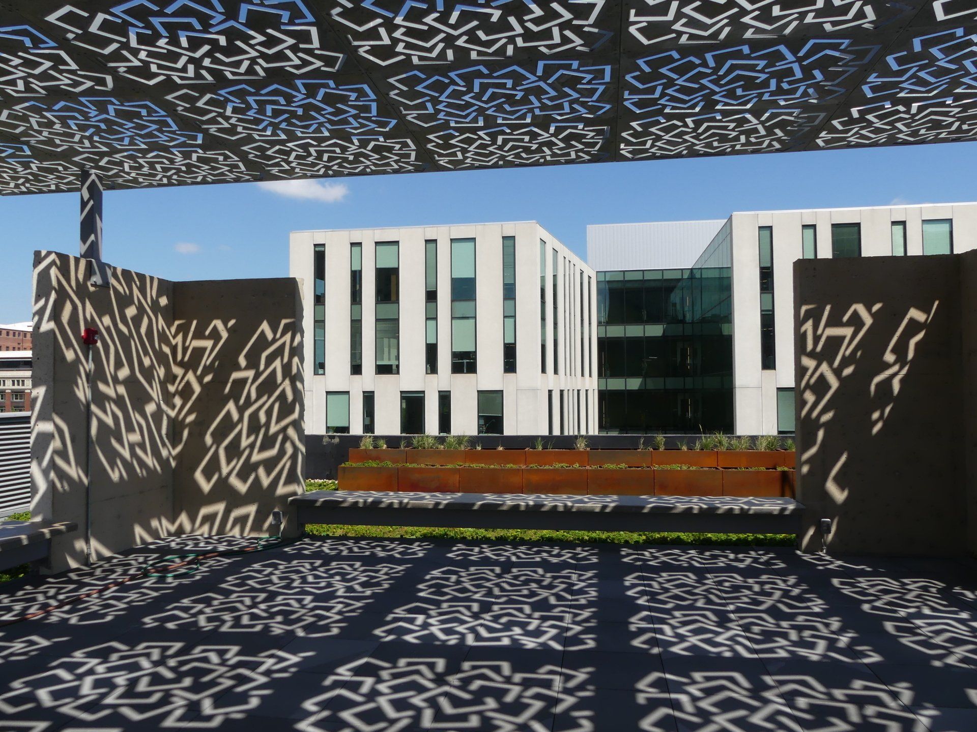 A large building with a blue sky in the background