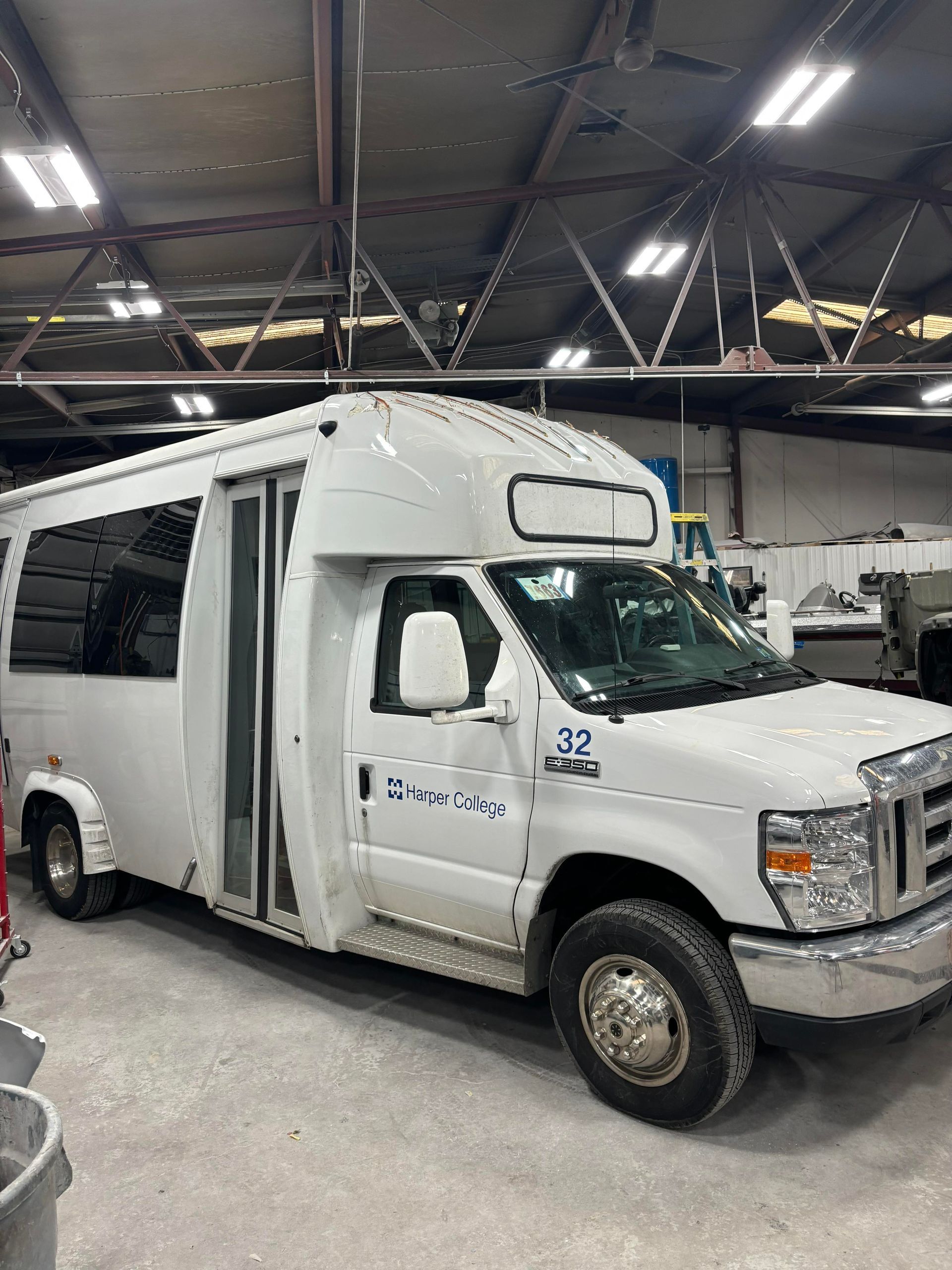 a white van is parked in a garage