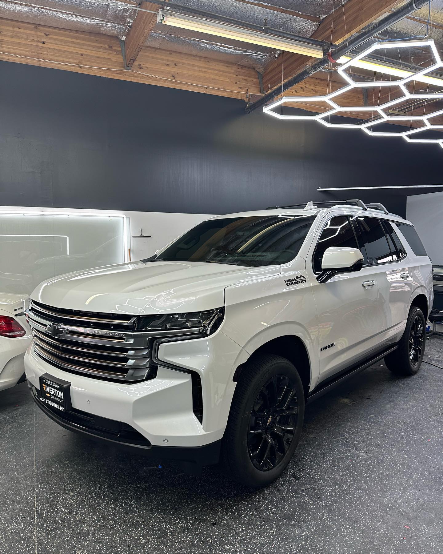 White Tahoe car - front view