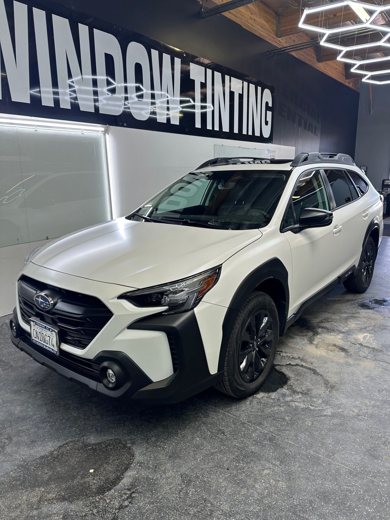 Paint protection film on white vehicle