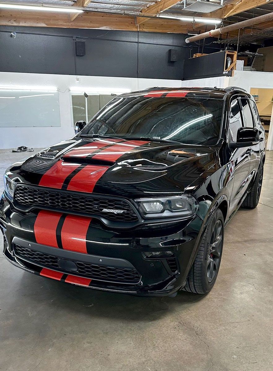 Racing stripes for a black car