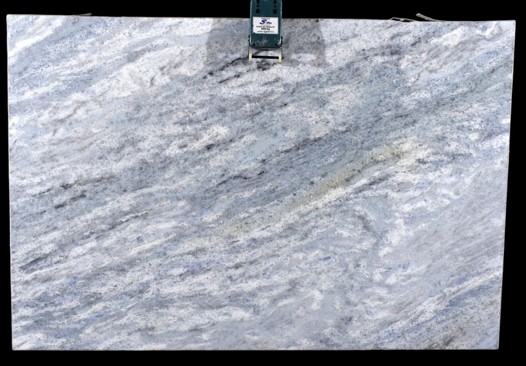 A close up of a marble slab on a black background.
