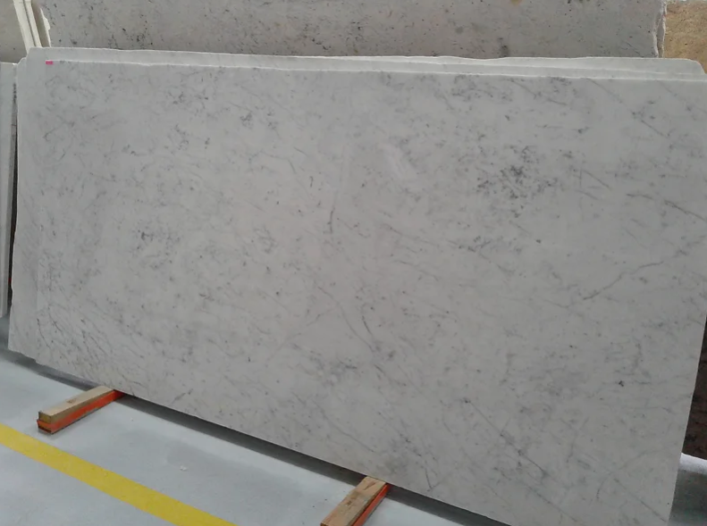 A white marble slab is sitting on top of a wooden stand.