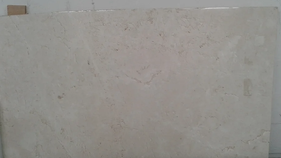 A large piece of white marble is sitting on top of a table.