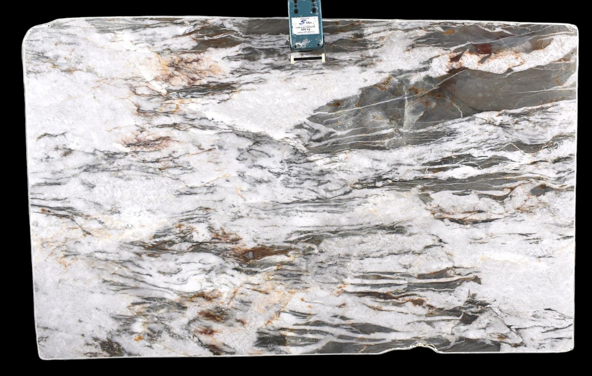 A piece of marble is hanging from a shelf