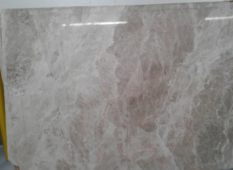 A close up of a marble slab sitting on top of a table.