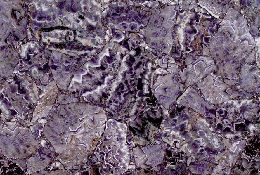A close up of a purple marble texture.