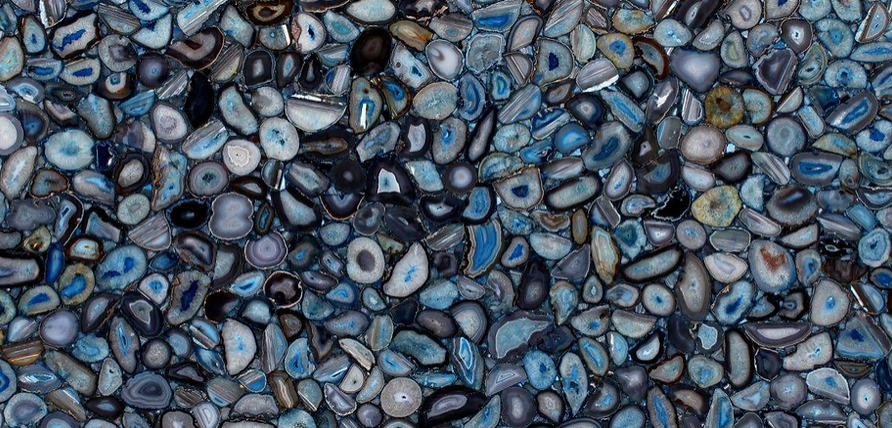 A close up of a blue agate stone counter top.
