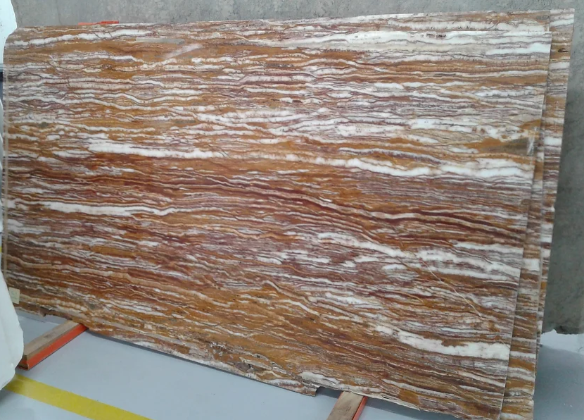 A large piece of wood is sitting on top of a table.