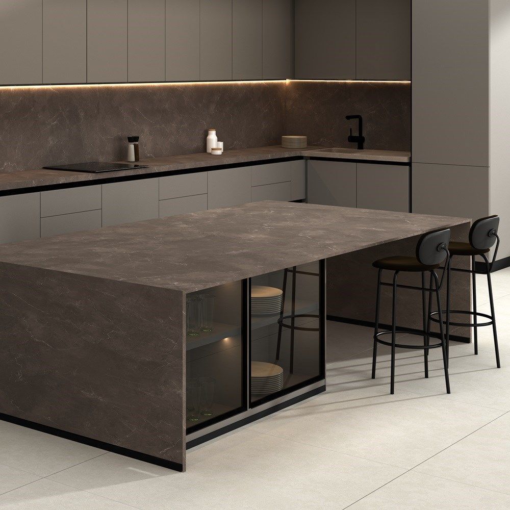 Modern kitchen with a gray island and cabinetry, stone countertop, and two bar stools.