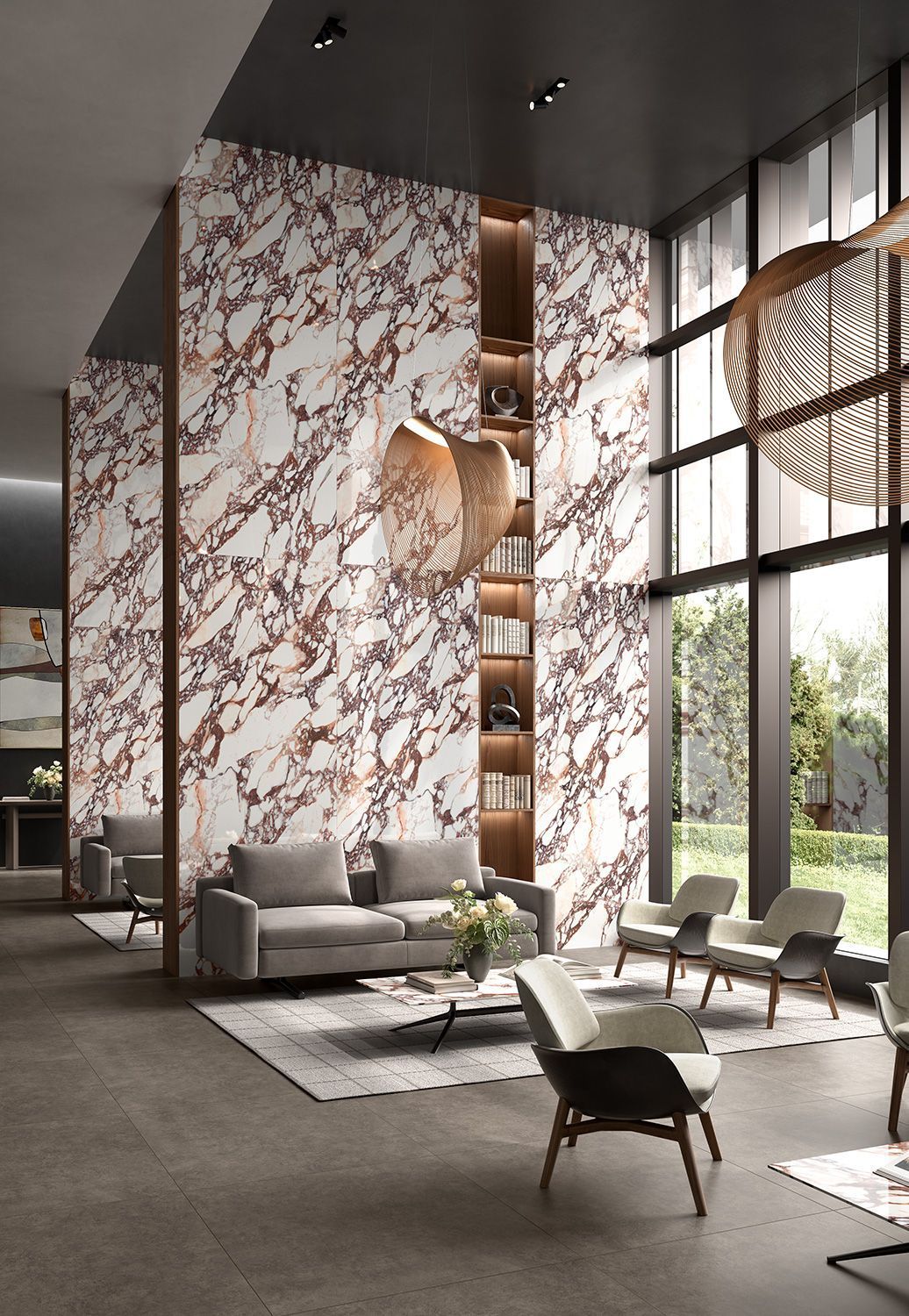 Luxurious lobby with marble wall, modern furniture, and large windows overlooking a garden.