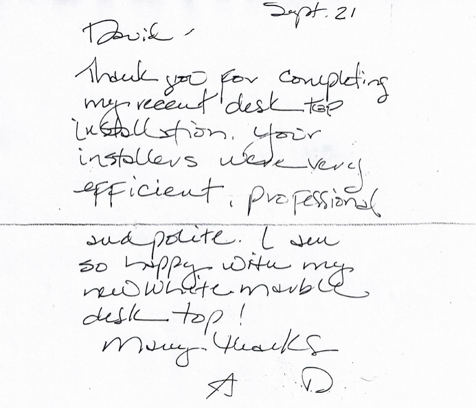 A handwritten note from a customer says thank you for completing my recent desk tab installation.