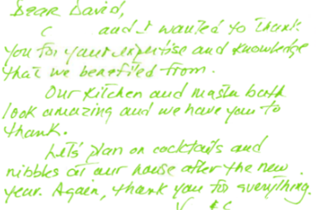 A letter is written in green on a white background