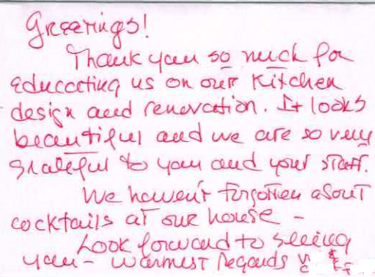 A handwritten note on a piece of paper that says greetings