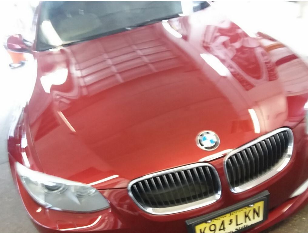 red BMW paint correction project